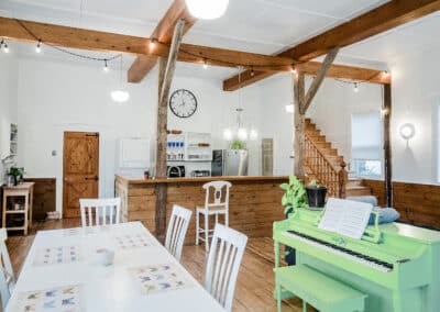 Chamcook Schoolhouse Air BnB St Andrews New Brunswick Great Room Kitchen Dining Living Room Post and Beam