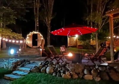 KOV Nordic Spa Chamcook Schoolhouse Package Yard Nighttime Sauna